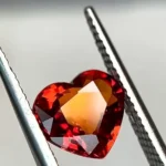 heart shaped orange red songea sapphire