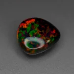 11.13 Ct Ethiopian Opal – Trillion Cut Natural Loose Gemstone with Play of Color