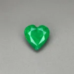 1.5 carat heart shaped natural green Zambian emerald