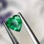 1.5 carat heart shaped natural green Zambian emerald