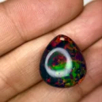 11.13 Ct Ethiopian Opal – Trillion Cut Natural Loose Gemstone with Play of Color