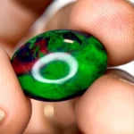7.56 Ct Ethiopian Opal – Oval Cut Natural Loose Gemstone with Green & Red Play of Color