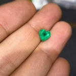 1.5 carat heart shaped natural green Zambian emerald