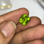 green peridot 7.14 carats cushion cut