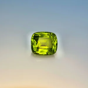 green peridot 7.14 carats cushion cut