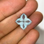 12 cts baby blue topaz curved in flower