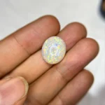 Natural Ethiopian White Opal with Play of Color – 11 Ct, 18×15 mm Loose Opal