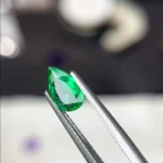 0.75 Ct Certified Panjshir Emerald pear shaped vivid green gemstone.