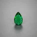 0.75 Ct Certified Panjshir Emerald pear shaped vivid green gemstone.