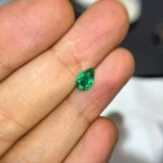0.75 Ct Certified Panjshir Emerald pear shaped vivid green gemstone.